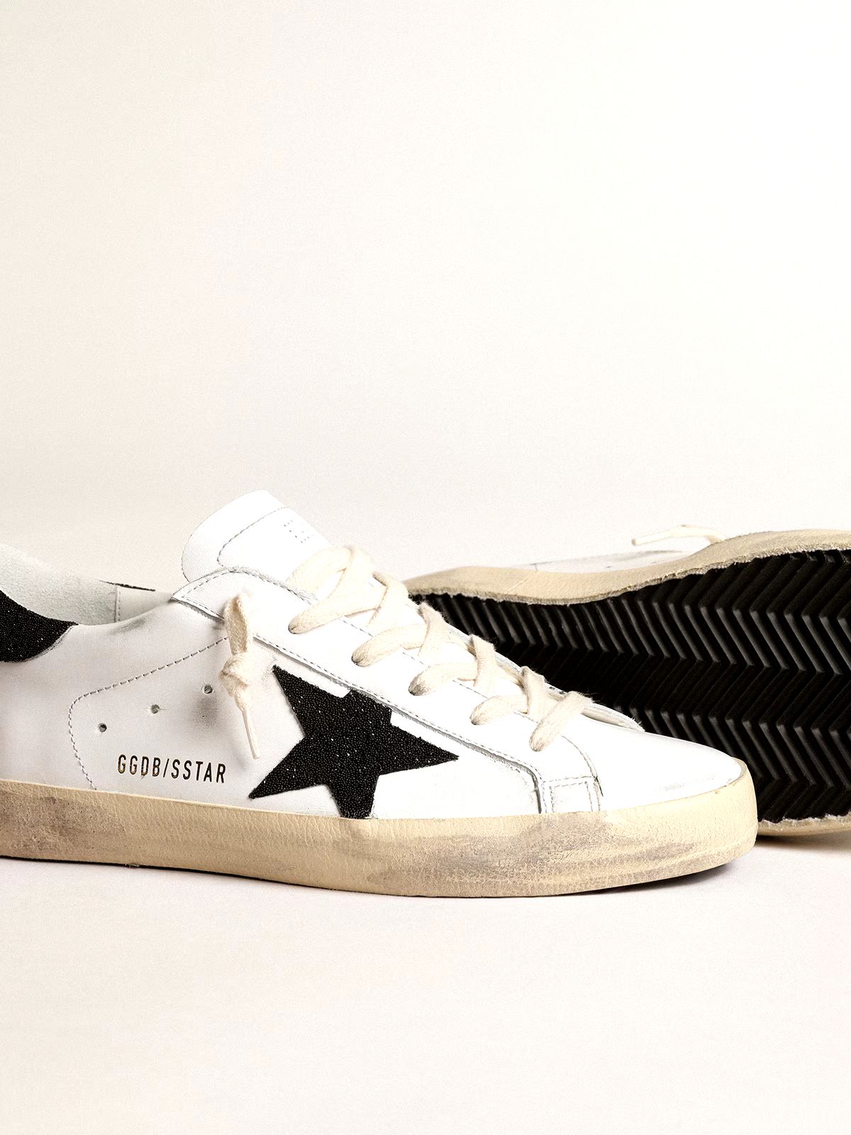 Super-Star Damen aus Nappa mit Stern aus goldfarbenem Glitzer und schwarzem Glitzer an der Fersenpartie